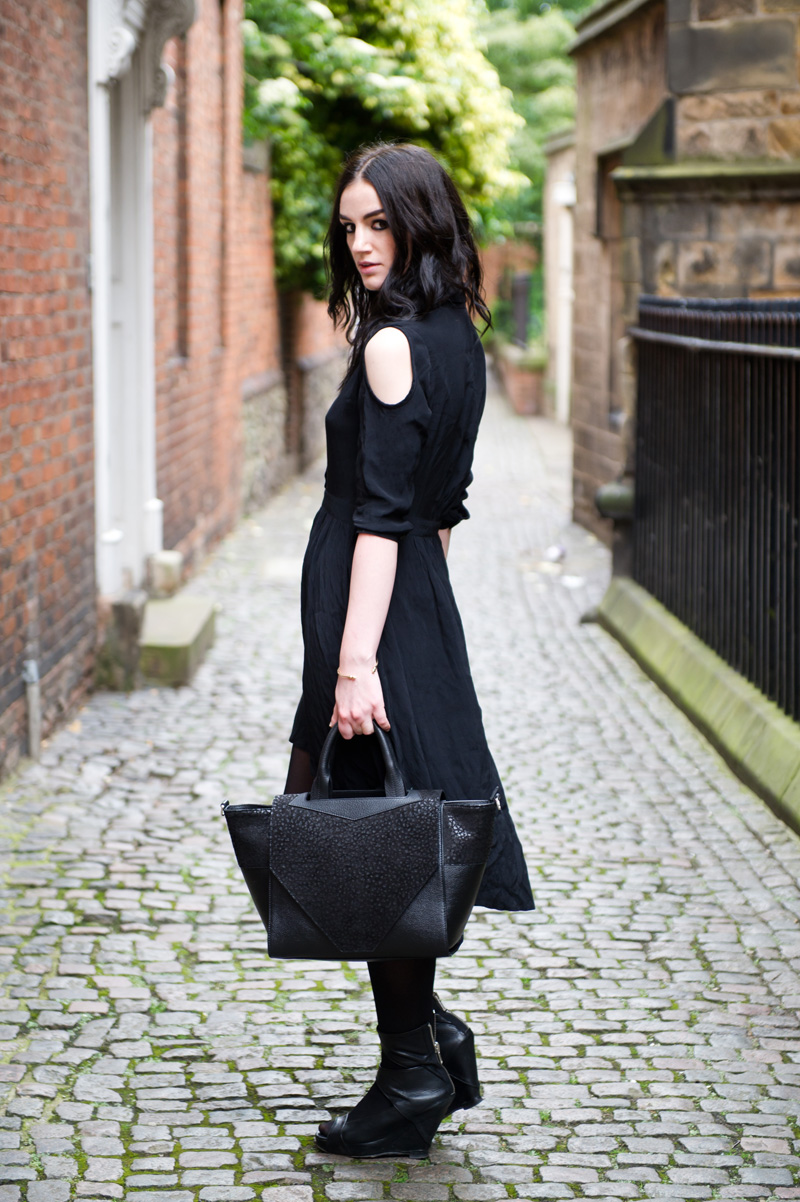 Fashion blogger Stephanie of FAIIINT wearing ASOS cold shoulder shirt dress, Bracher Emden Classic structured tote, Rick Owens wedges, ASOS spiked bangle. All black outfit, goth, street style.