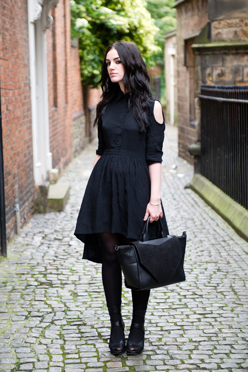 Fashion blogger Stephanie of FAIIINT wearing ASOS cold shoulder shirt dress, Bracher Emden Classic structured tote, Rick Owens wedges, ASOS spiked bangle. All black outfit, goth, street style.