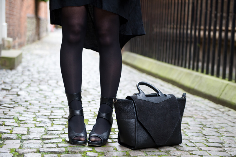Fashion blogger Stephanie of FAIIINT wearing ASOS cold shoulder shirt dress, Bracher Emden Classic structured tote, Rick Owens wedges, ASOS spiked bangle. All black outfit, goth, street style.
