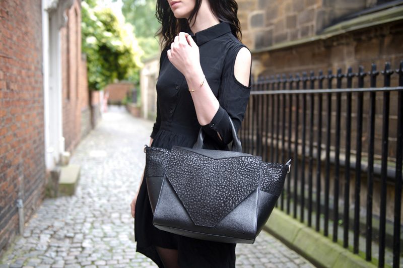 Fashion blogger Stephanie of FAIIINT wearing ASOS cold shoulder shirt dress, Bracher Emden Classic structured tote, Rick Owens wedges, ASOS spiked bangle. All black outfit, goth, street style.