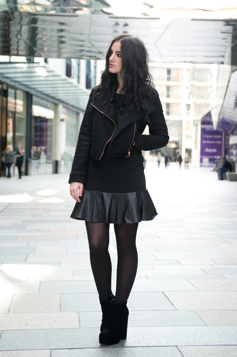 Fashion blogger Stephanie of FAIIINT wearing Minkpink wool biker jacket, Little Mistress faux leather frill dress, Stylistpick velvet boots. All black, street style, goth.