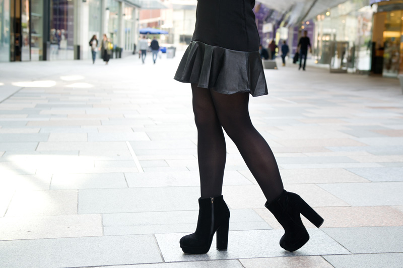 Fashion blogger Stephanie of FAIIINT wearing Minkpink wool biker jacket, Little Mistress faux leather frill dress, Stylistpick velvet boots. All black, dark, street style, goth.