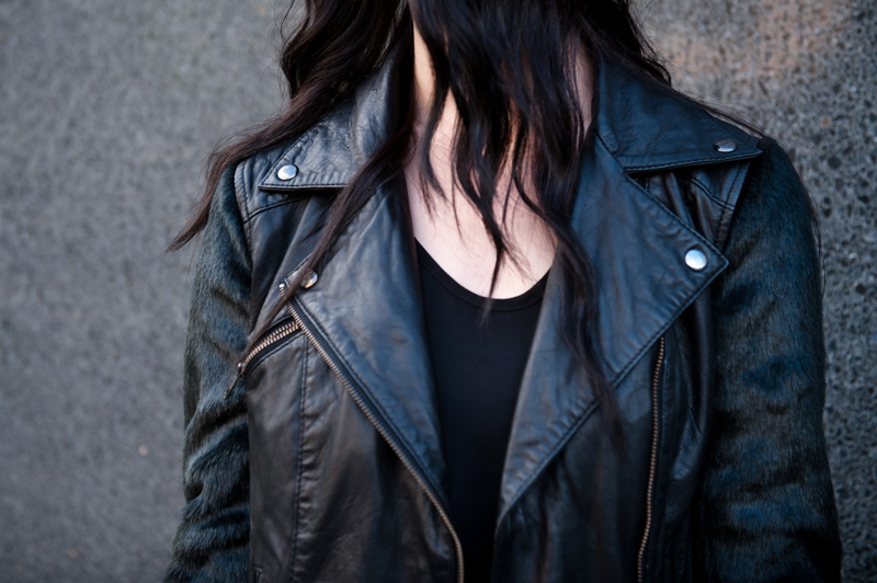 Fashion blogger Stephanie of FAIIINT wearing ASOS leather & faux fur biker jacket, MeeMee dip hem dress. All black outfit, street style, grunge, goth, casual.