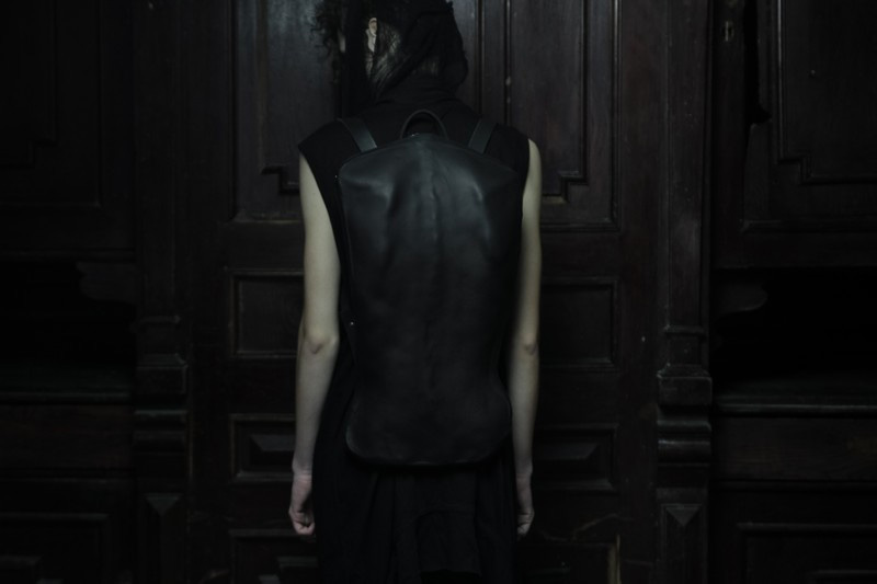 Konstantin Kofta 'Hug' collection black leather scoliosis backpack bag twisted spine human anatomy. Dark style, gothic, indepenent designer, lookbook