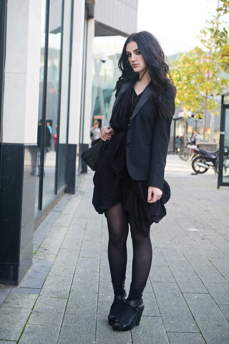 Fashion blogger Stephanie of FAIIINT wearing Superdry x Timothy Everest Rock Rebel Blazer, Allsaints draped anglaise dress, Rick Owens wedges, Balenciaga city bag. All black outfit.