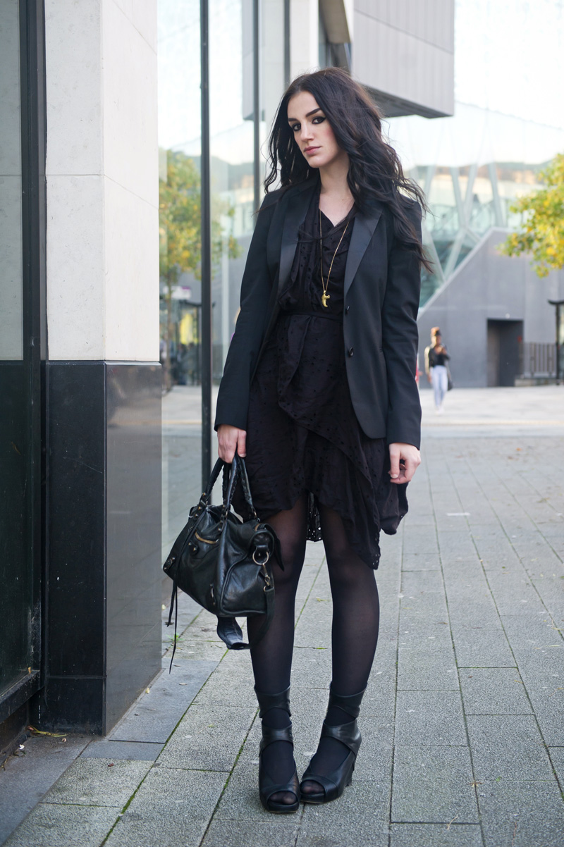 Fashion blogger Stephanie of FAIIINT wearing Superdry x Timothy Everest Rock Rebel Blazer, Allsaints draped anglaise dress, Rick Owens wedges, Balenciaga city bag. All black outfit.