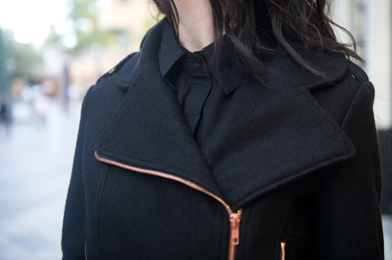 Fashion blogger Stephanie of FAIIINT wearing minkpink wool biker jacket, Pussycat London pleated shirt dress.