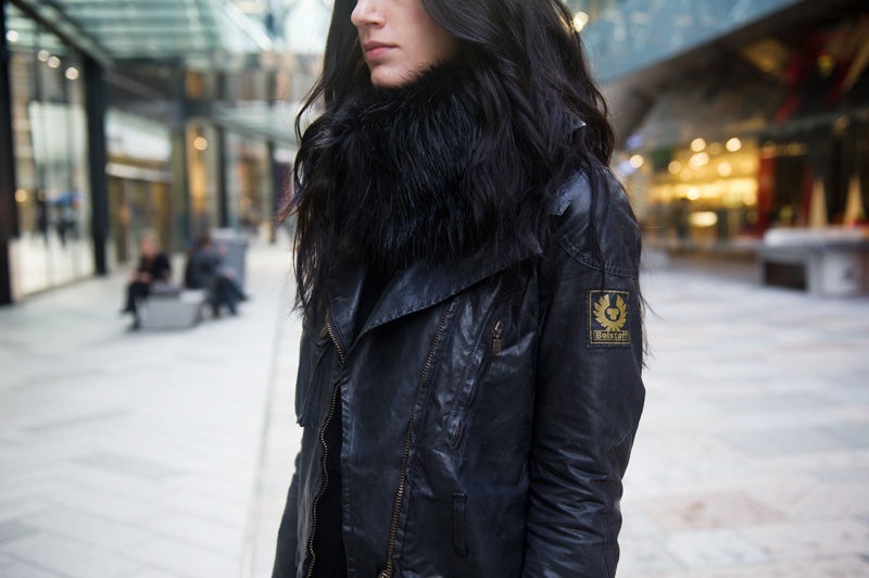 Fashion blogger Stephanie of FAIIINT wearing Belstaff Sammy Miller Waxed Biker Jacket, Faux Fur snood scarf. All Black.