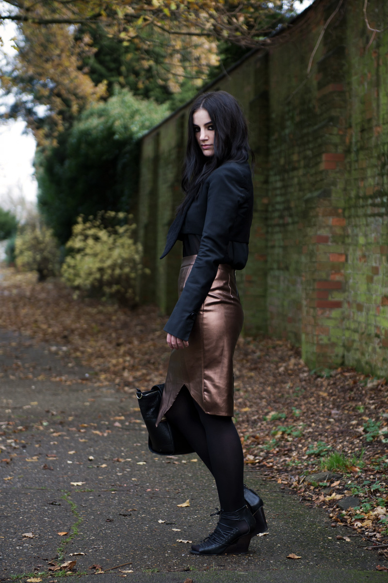 Fashion blogger Stephanie of FAIIINT wearing Todd Lynn x Topshop jacket, Heart by Nana Judy chiffon shirt, Poppy Lux bronze metallic pencil skirt, Finsk laced wedges, Bracher Emden classic bag