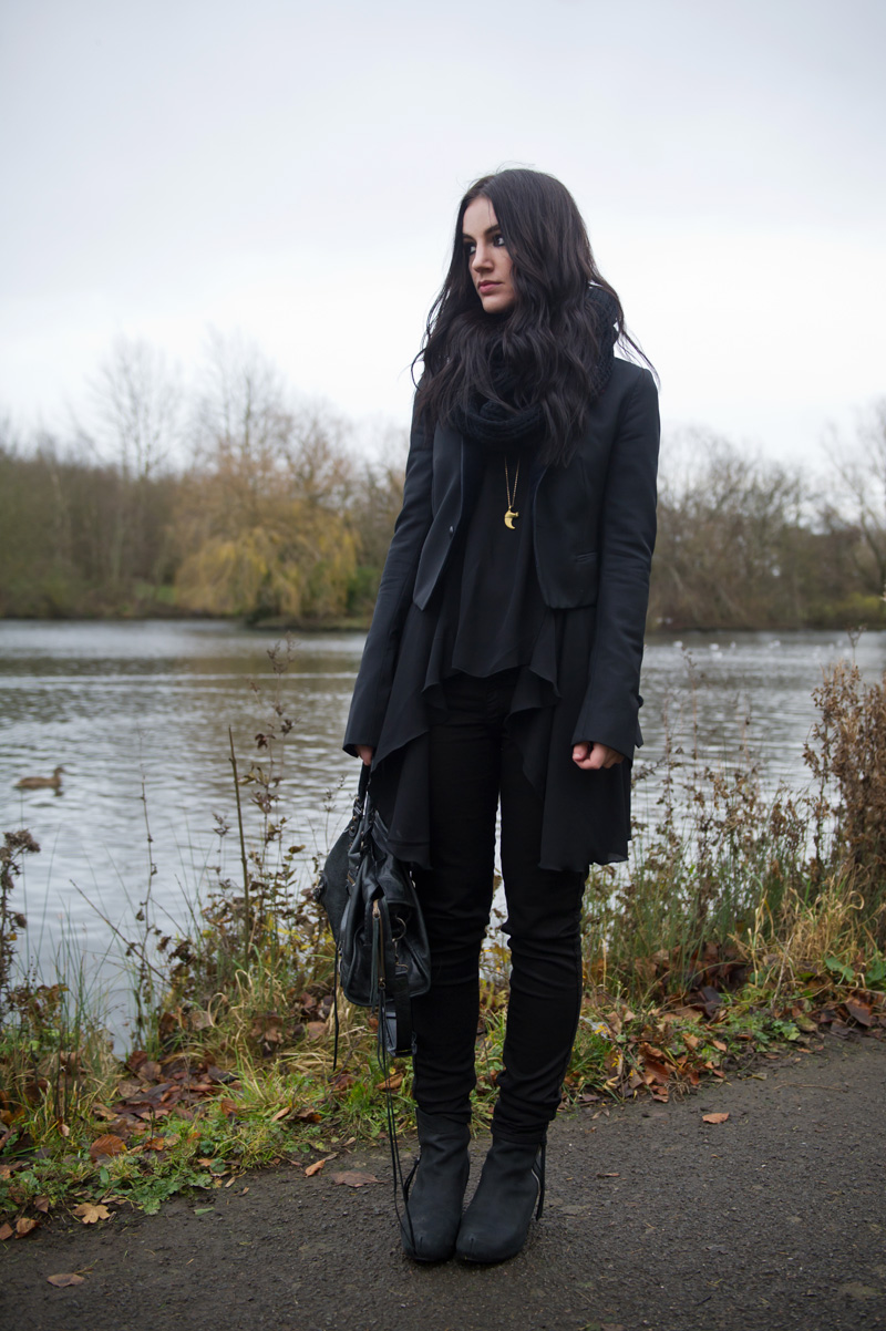 Fashion blogger Stephanie of FAIIINT wearing Todd Lynn x Topshop tux jacket, LOVE in love with fashion drape drop side top, Meltin Pot B-side reversible emma jeans, Kurt Geiger strut wedges, ASOS snood, Balenciaga city bag. All black outfit, gothic, casual.