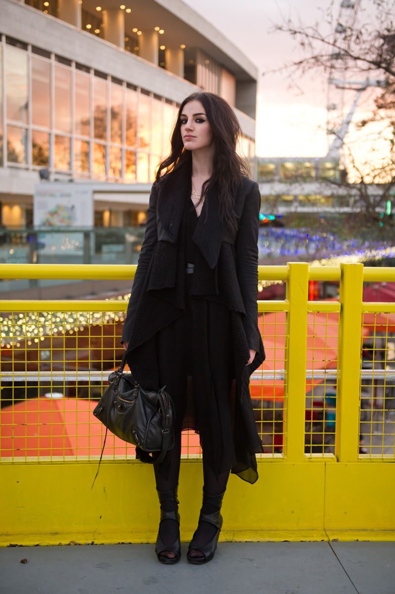 Fashion blogger Stephanie of FAIIINT wearing Todd Lynn for Topshop Cropped Tux Jacket with fur collar, ASOS waterfall draped cardigan, Warehouse chiffon dress, Rick Owens Wedges, Balenciaga City Bag. All black outfit, london, tourist, eye, dark style, goth outfit.