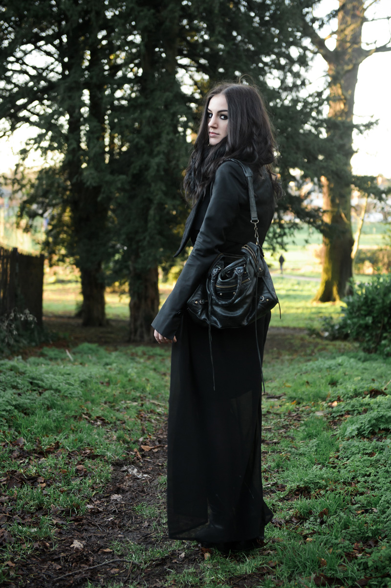 Fashion blogger Stephanie of FAIIINT wearing Todd Lynn x Topshop Cropped Jacket, Faux Fur Snood, Lookbook Store Maxi Dress / ASOS Wrap Belt, Cinderela B Layred Necklace, Balenciaga City bag. All black everything, goth street style.