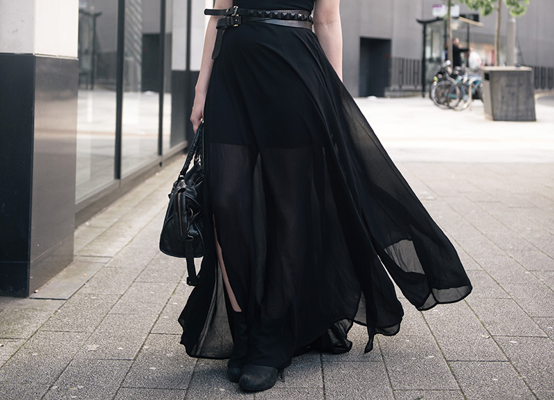 Fashion blogger Stephanie of FAIIINT wearing Choies black chiffon maxi dress, ASOS & Topshop studded wrap belt, Kurt Geiger boots, Balenciaga city. All black summer goth street style outfit.