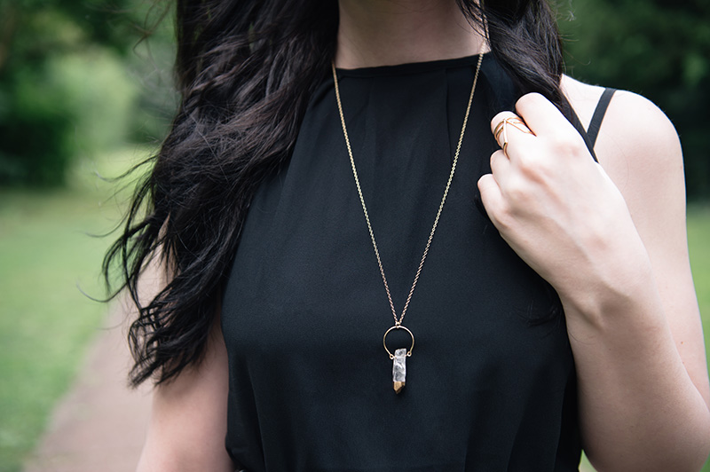 FAIIINT Abaday black dress, Younghearts gold dipped clear quartz crystal necklace, RockLove sacred geometry arrow ring