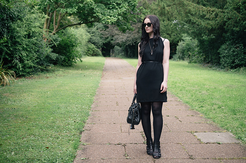Fashion blogger Stephanie of FAIIINT wearing Abaday chiffon dress, Ray Ban Wayfarer sunglasses, Younghearts quartz crystal necklace, Kurt Geiger buckled wedges, Balenciaga city bag. All black, dark fashion gothic summer street style outfit