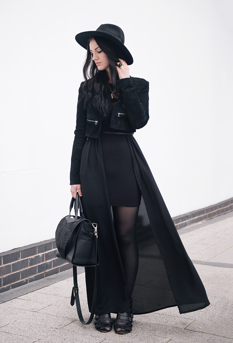 Fashion blogger Stephanie of FAIIINT wearing Catarzi fedora, Topshop laser cut cropped suede jacket, ASOS dress, BooHoo maxi chiffon kimono, Rocklove sacred geometry arrow ring & gold chevron necklace, Kasun London vampire bite ring, Kurt Geiger buckled wedges. All black goth witch street style outfit.