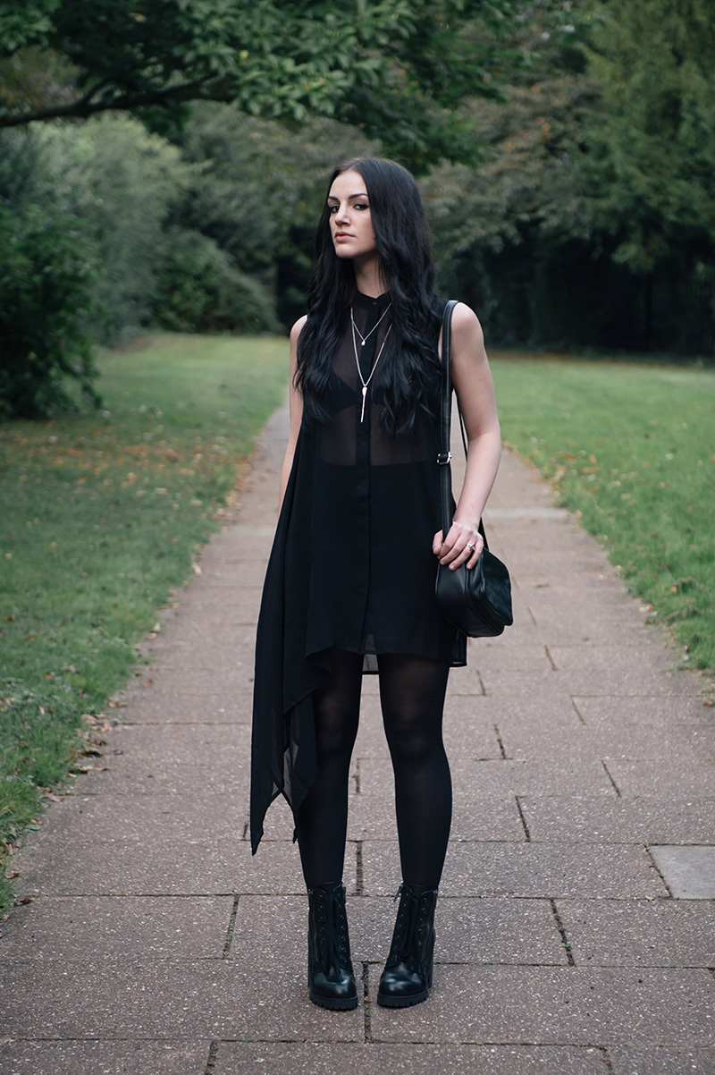 Fashion blogger Stephanie of FAIIINT wearing H&M chiffon asymmetric shirt, ASOS Mini skirt, Bloody Mary Metal silver lovehunters arrow & tiny tooth necklace & fire alchemy ring, Betty Jackson Black designers at Debenhams zip leather bag, Ash Poker zip lace up boots from Daniel Footwear. All black summer dark street style outfit