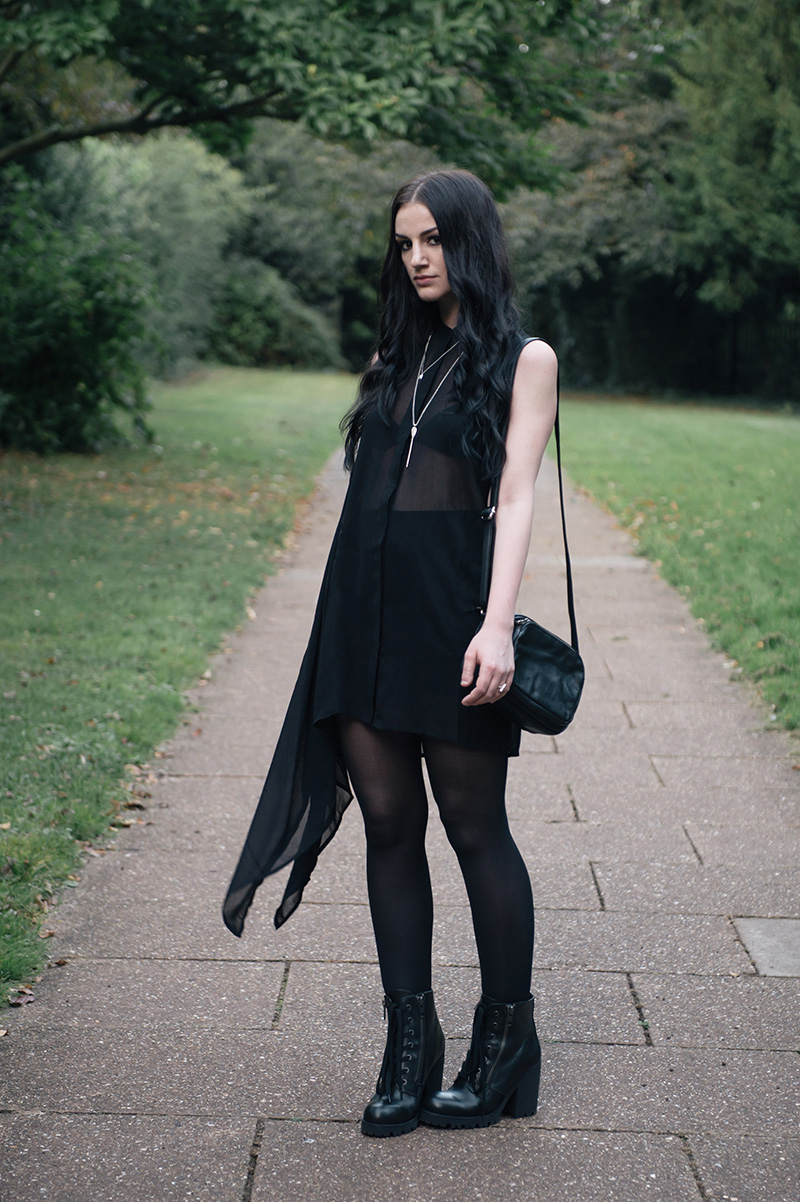 Fashion blogger Stephanie of FAIIINT wearing H&M chiffon asymmetric shirt, ASOS Mini skirt, Bloody Mary Metal silver lovehunters arrow & tiny tooth necklace & fire alchemy ring, Betty Jackson Black designers at Debenhams zip leather bag, Ash Poker zip lace up boots from Daniel Footwear. All black summer dark street style outfit