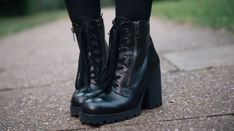 Fashion blogger Stephanie of FAIIINT wearing Ash Poker zip lace up boots from Daniel Footwear