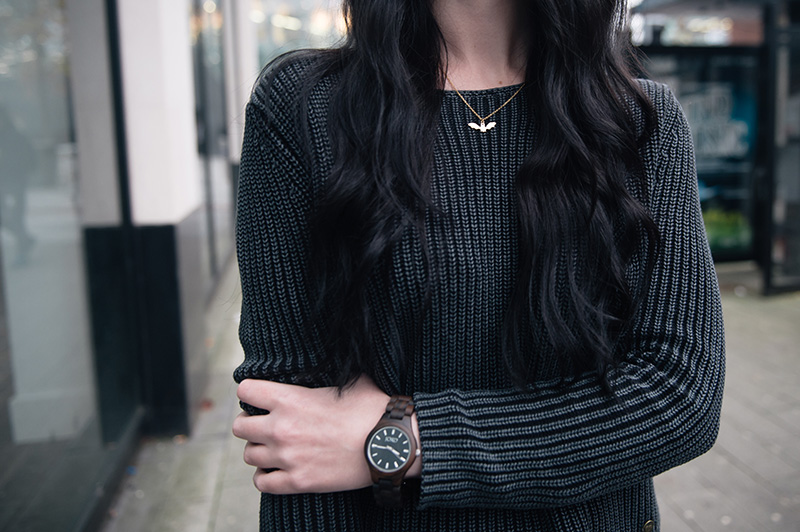 Fashion blogger Stephanie of FAIIINT wearing Yumi ribbed knit grey jumper, Jord wood watch, Phoebe Jewellery little gold bat necklace. details.