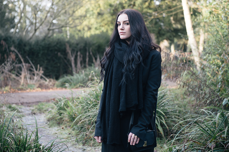 Fashion blogger Stephanie of FAIIINT wearing ASOS oversized scarf, Todd Lynn x Topshop Tux Jacket, State of Being cross over maxi skirt, Nica Venice small crossbody bag, Phoebe Jewellery moonstone moon & star double ring. All black street style gothic draped outfit.
