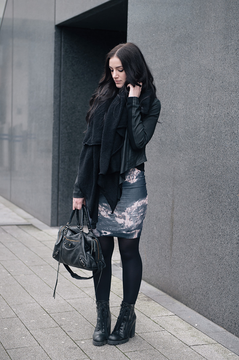 Fashion blogger Stephanie of FAIIINT wearing ASOS scarf, Barneys Original's draped leather jacket, Daisy Street oil spill printed dress, Ash Poker lace up boots, Balenciaga city bag. All black gothic casual street style outfit.