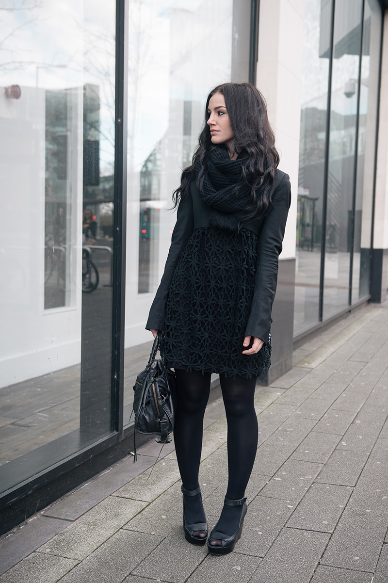 Fashion blogger Stephanie of FAIIINT wearing ASOS snood, Todd Lynn x Topshop cropped jacket, Seafolly crochet daisy kaftan via Beach Cafe, Skin by Finsk wedges, tights, Balenciaga city bag. All black everything street style winter outfit.