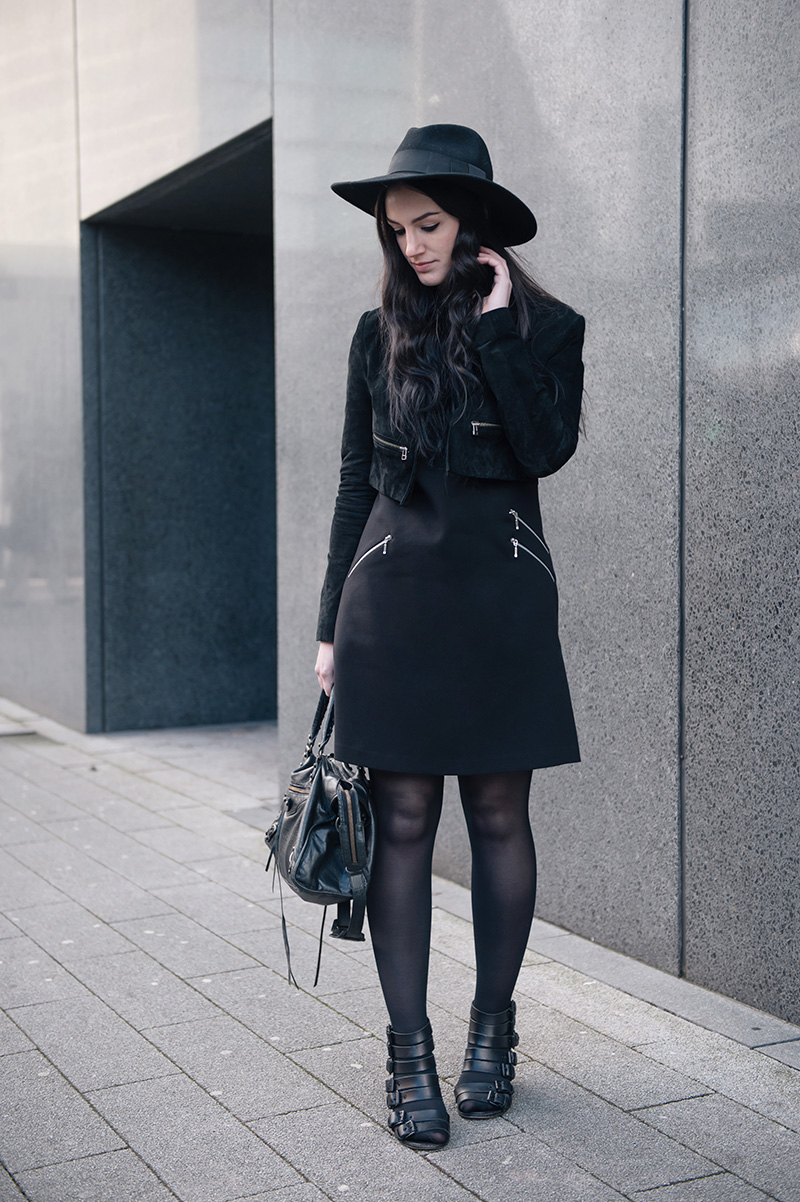 Fashion blogger Stephanie of FAIIINT wearing Catarzi Fedora, Topshop Cropped Suede Jacket, F&F at Tesco Zip Shift Dress, Kurt Geiger Buckled Wedges, Balenciaga City Bag. All black everything smart gothic street style.