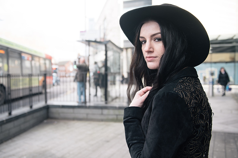 Fashion blogger Stephanie of FAIIINT wearing Catarzi Fedora, Topshop Cropped Suede Jacket, F&F at Tesco Zip Shift Dress. Details portrait.