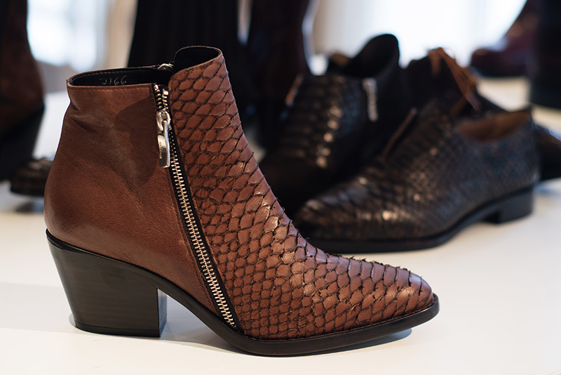 PLFM London footwear show press day Autumn Winter 2015. C Doux burnt orange brown pointed toe ankle boots in snake textured leather with zips.