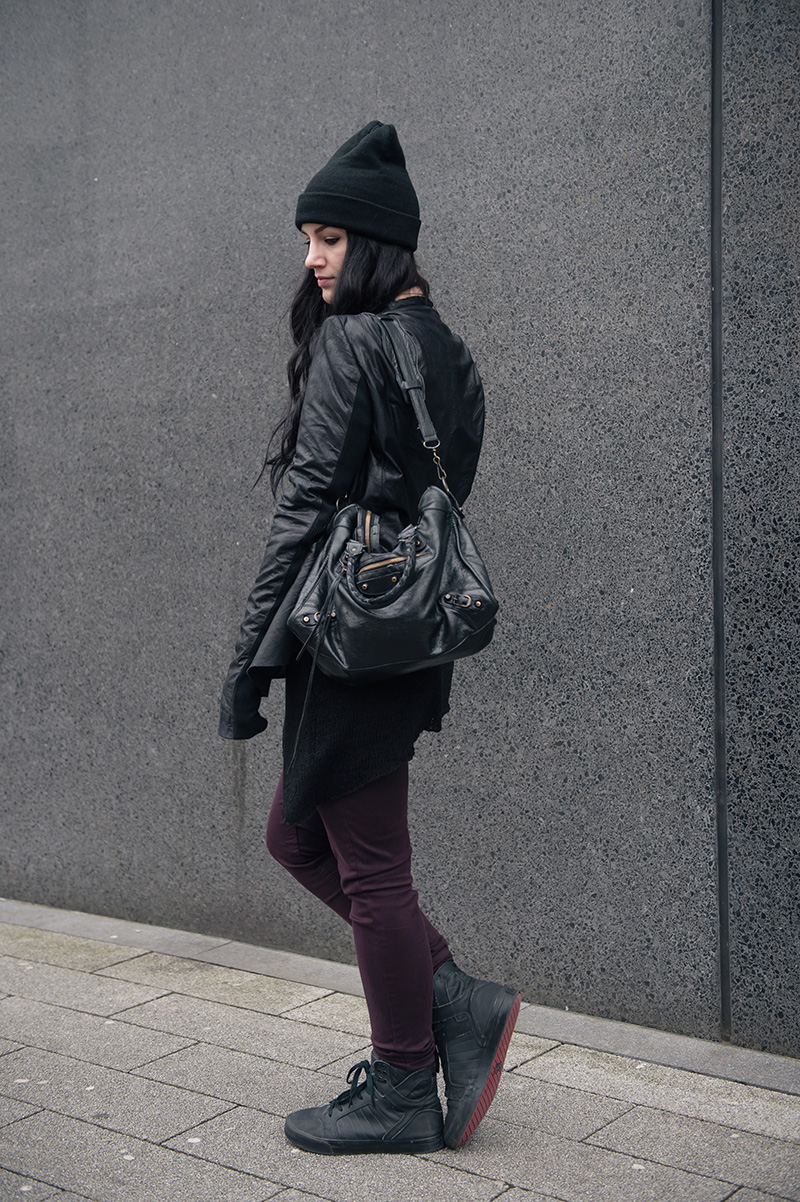 Fashion blogger Stephanie of FAIIINT wearing ASOS beanie, Rick Owens leather jacket, H&M asymmetric knit jumper New Look burgundy jeans, Supra skytop tuf sneakers, balenciaga city bag. All black casual grungy dark street style outfit