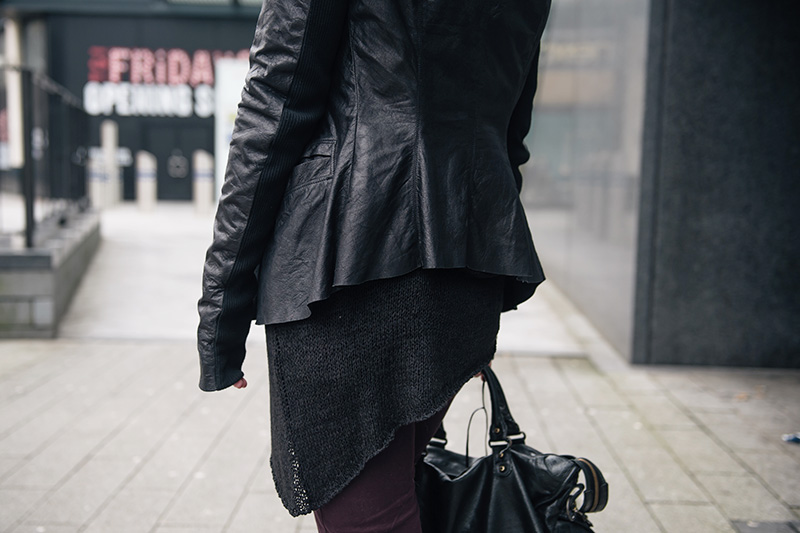 Fashion blogger Stephanie of FAIIINT wearing Rick Owens leather jacket, H&M asymmetric knit jumper New Look burgundy jeans. Details. All black casual grungy dark street style outfit
