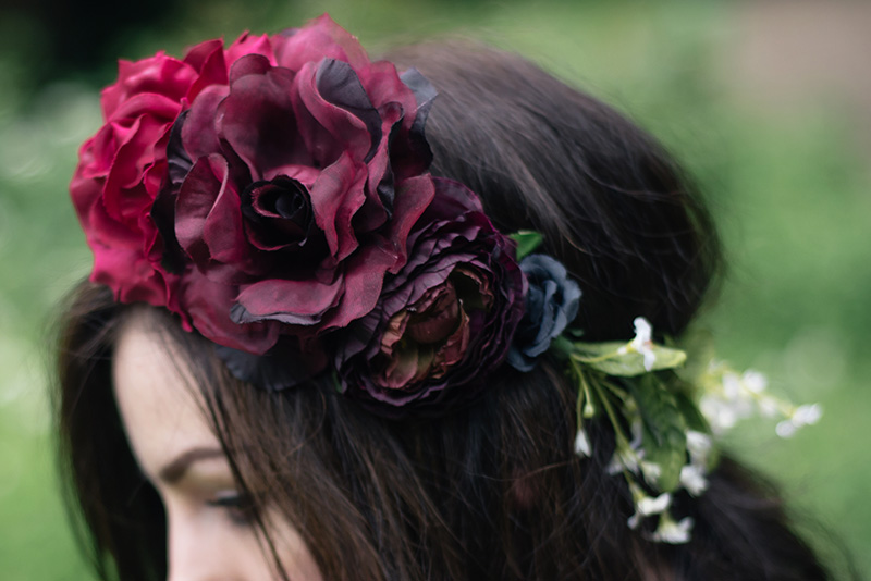 Fashion blogger FAIIINT wearing Gypsy Rose Vintage plum, pink & black flower crown with roses, peonies & white gypsophila wild flowers.