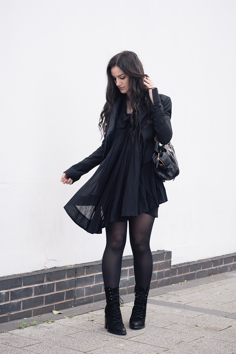 Fashion blogger Stephanie of FAIIINT wearing Todd Lynn x Topshop tux jacket, AllSaints Agena draped dress, Mulberry Mabel bag large, A Weathered Penny Geo necklace and ring, Kurt Geiger Saturn boots. All black everything goth dark street style outfit.
