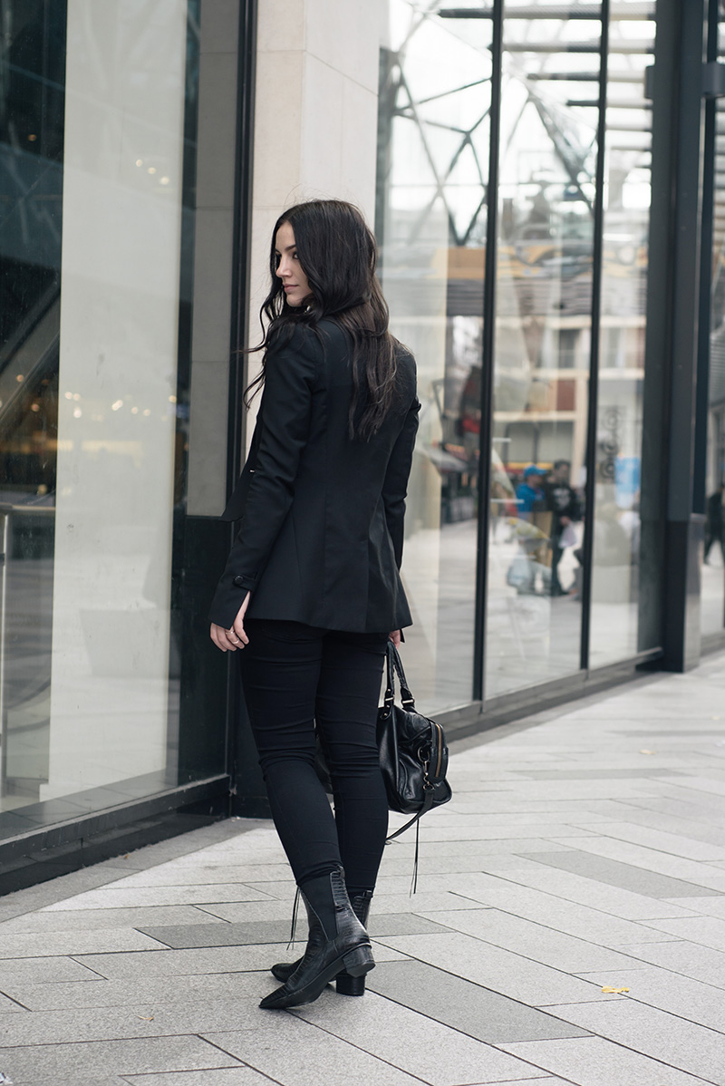 Fashion blogger Stephanie of FAIIINT wearing Topshop x Todd Lynn tux jacket, River Island draped top, George Wonderfit jeans, ASH Mira crocodile ankle boots, Happiness Boutique Opalescent necklace, Balenciaga city bag. All black everything smart casual dark style outfit.
