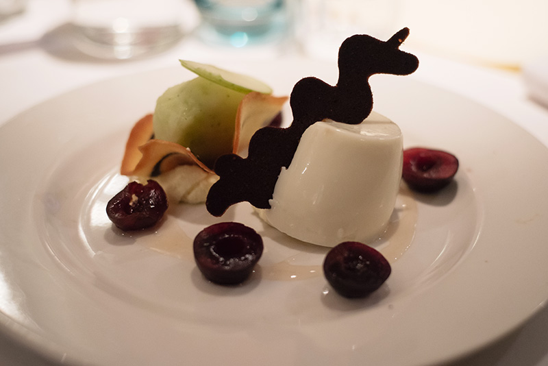 Fine Dine on a Diet at The White Peacock in Leicester. Coconut and lemongrass pannacotta with compressed cherries, apple sorbet, tuile.