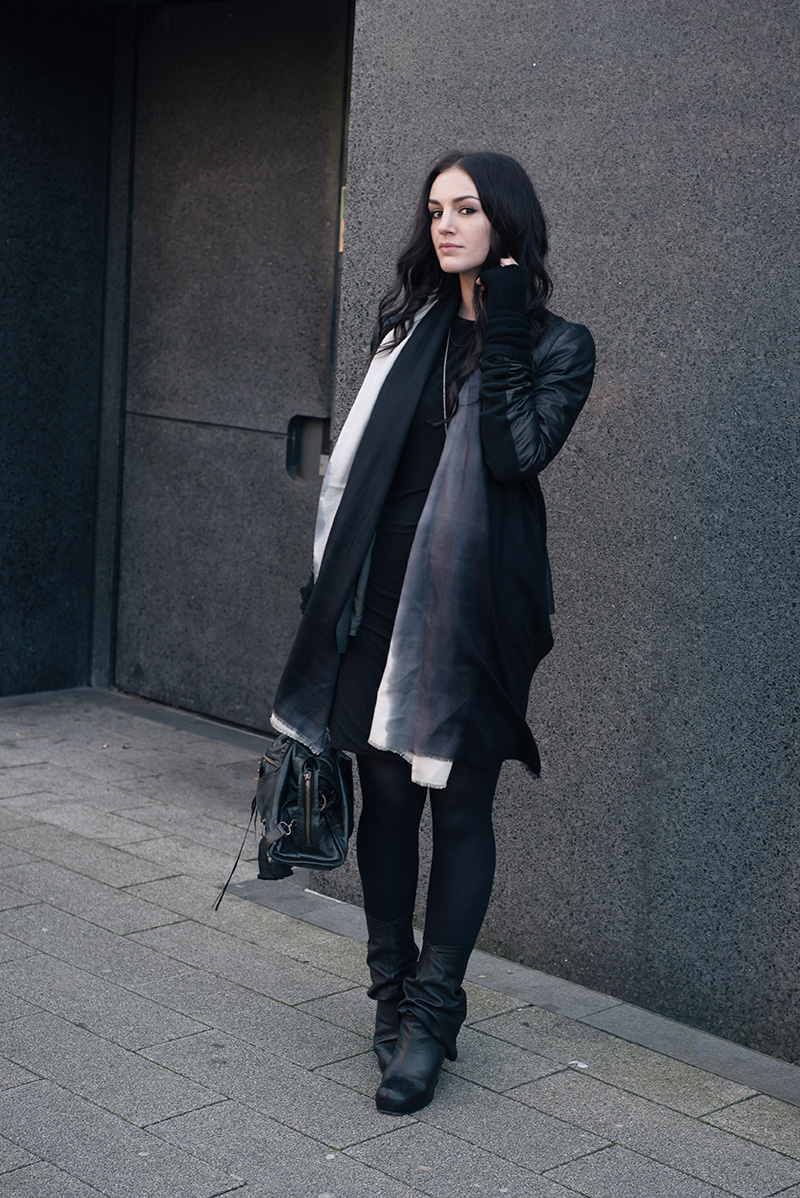Fashion blogger Stephanie of FAIIINT wearing Rick Owens leather jacket & peaked back wedge boots, Black.co.uk ombre fade cashmere scarf & cashmere knit wrist warmer gloves, H&M dress, Hvnter Gvtherer necklace, Balenciaga city bag. All black everything dark street style winter outfit.