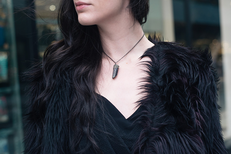 Fashion blogger Stephanie of FAIIINT wearing H&M black purple faux fur jacket, Elemental Luxury titanium quartz raw crystal necklace. Outfit details.