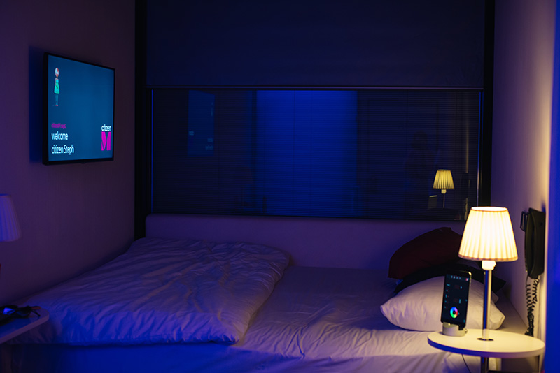 Citizen M Hotel Glasgow room at night with mood lighting