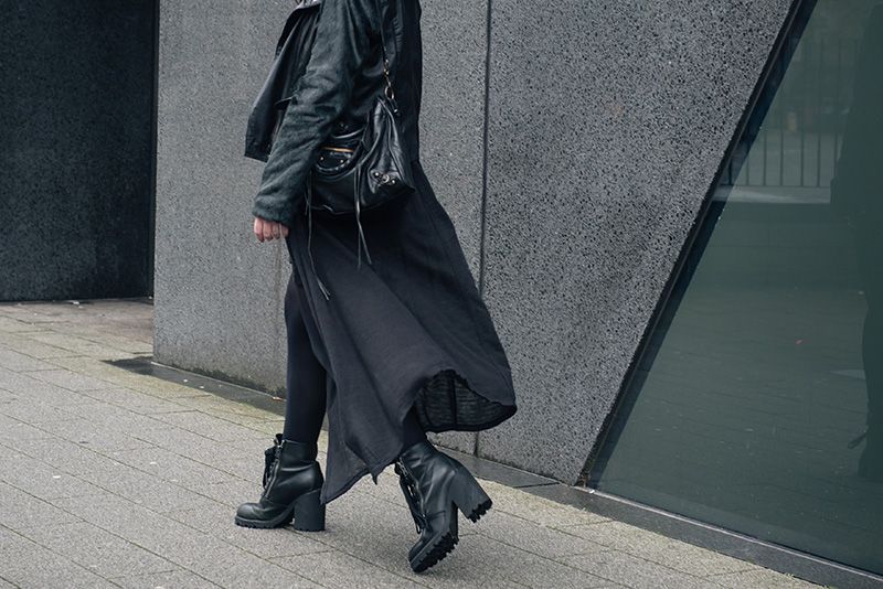 Fashion blogger Stephanie of FAIIINT wearing ASOS faux fur and leather biker jacket, H&M draped maxi cardigan, ASH Poker boots, Balenciaga city bag. Outfit details.