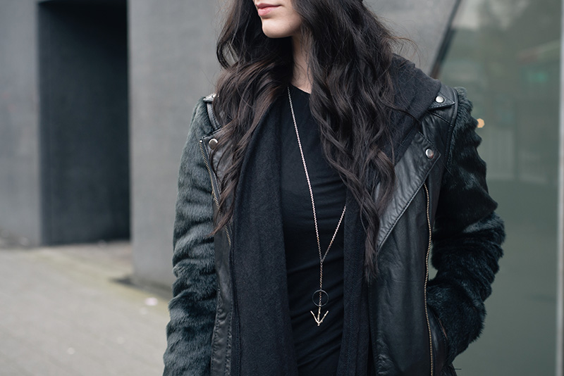 Fashion blogger Stephanie of FAIIINT wearing ASOS faux fur and leather biker jacket, H&M draped maxi cardigan, Hvnter Gvtherer Lacustrine necklace. All black outfit details.