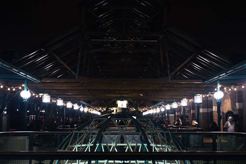 Hyper Japan Christmas Market 2015 at Tobacco Dock London at night.