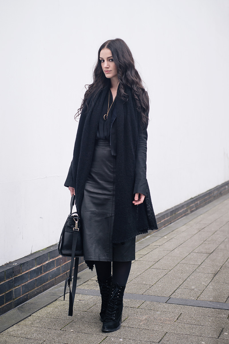 Fashion blogger Stephanie of FAIIINT wearing ASOS scarf, Todd Lyn x Topshop tux jacket, River Island drape blouse, Brag Vintage leather pencil skirt, Young Hearts quartz necklace, Kurt Geiger lace up Saturn boots, Bracher Emden bag. All black everything dark street style outfit.