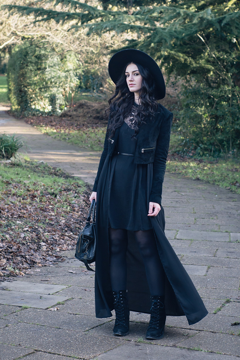 Fashion blogger Stephanie of FAIIINT wearing H&M oversized fedora, Topshop suede cropped jacket, SheIn crochet lace dress, Boohoo maxi kimono, Kurt Geiger 'Saturn' lace up boots, Balenciaga city bag. All black everything dark street style outfit, goth witchy.