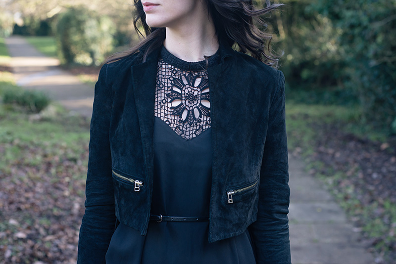 Fashion blogger Stephanie of FAIIINT wearing Topshop suede cropped jacket, SheIn black crochet lace dress. Outfit details.