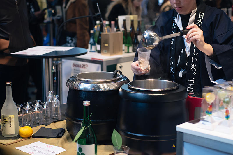 Hyper Japan Christmas Market 2015 at Tobacco Dock London. Warm sake.