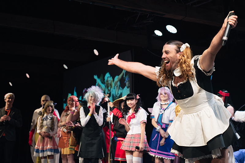 Hyper Japan Christmas Market 2015 Tobacco Dock London. Lady Beard from LadyBaby on stage with cosplayers.