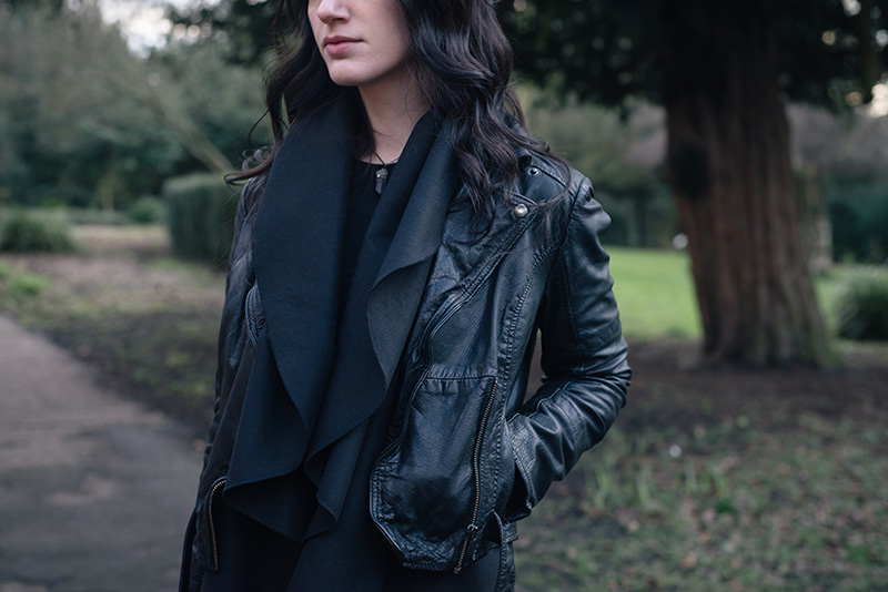 Fashion blogger Stephanie of FAIIINT wearing MuuBaa leather biker jacket, SheIn draped waistcoat, ASOS dress, Elemental Luxury quartz necklace. Outfit details.