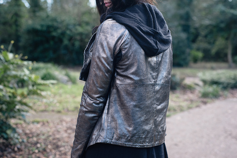 Fashion blogger Stephanie of FAIIINT wearing MuuBaa metallic pewter silver leather drape jacket, H&M hoodie cardigan. Outfit details.