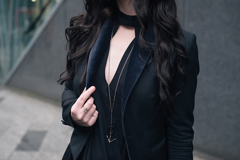 Fashion blogger Stephanie of FAIIINT wearing New Look draped cut out blouse, Todd Lynn x Topshop tux jacket, Hvnter Gvtherer Lacustrine necklace, Birds N Bones silver taxidea claw and Mus Hip rings. All black everything outfit details.